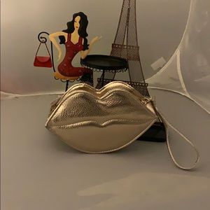 Gold lip wristlet